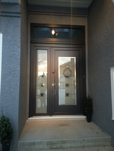 Front entry door in Calgary with a sidelight