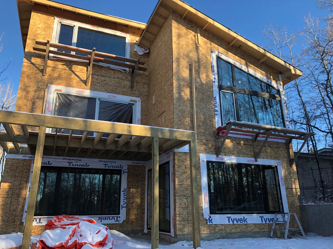 Full house replaced with new european Tilt and turn windows and sliding doors. In Calgary.
